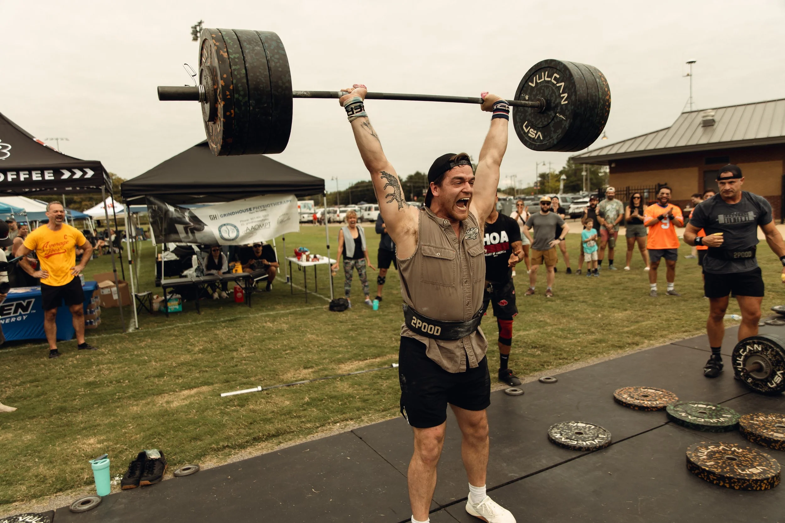 Competitor mid lift in front of the crowd